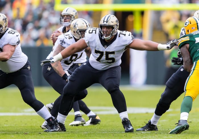 Saints guard Andrus Peat blocking up front